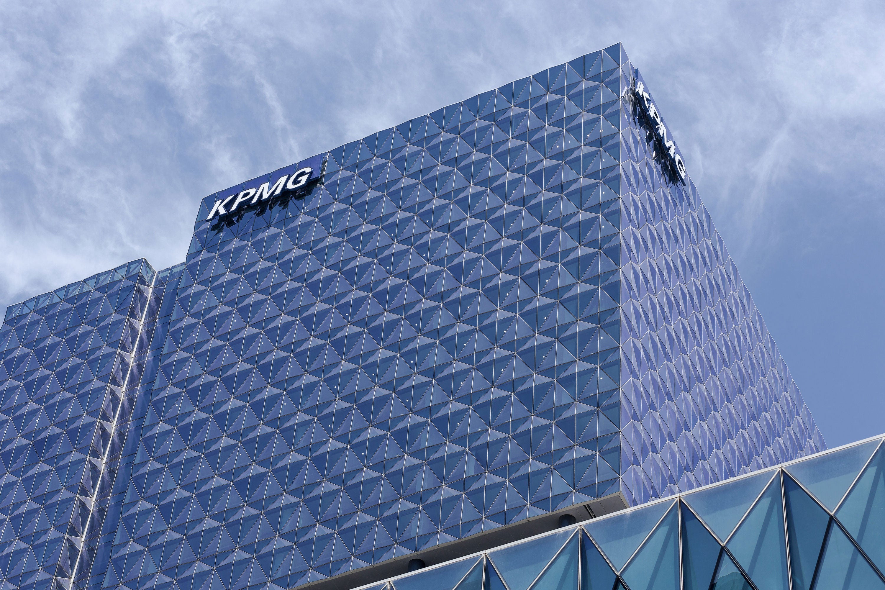 Big Four Firms Hit Revenue Slump, Eye Recovery